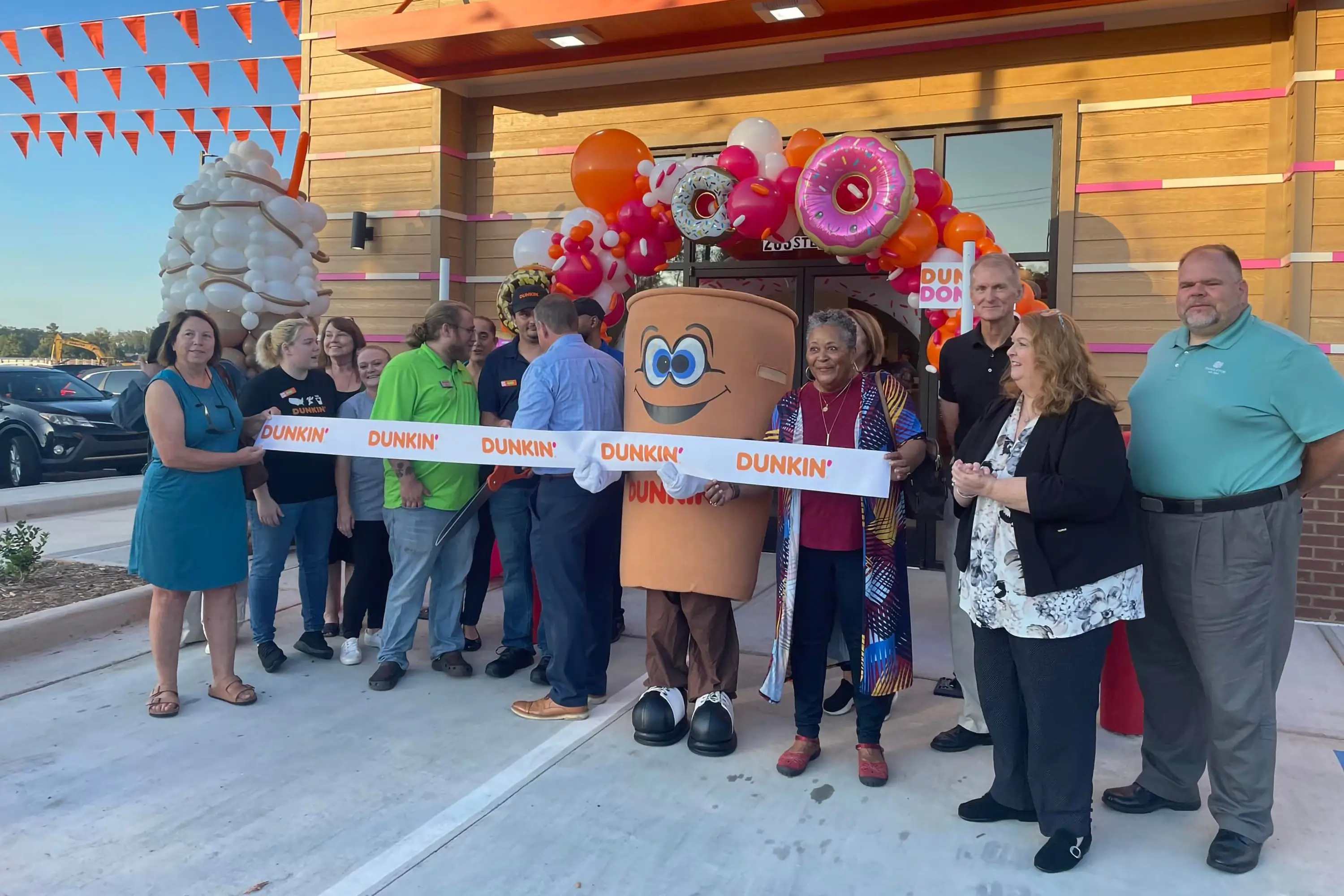 The ribbon cutting of Dunkin' Donuts