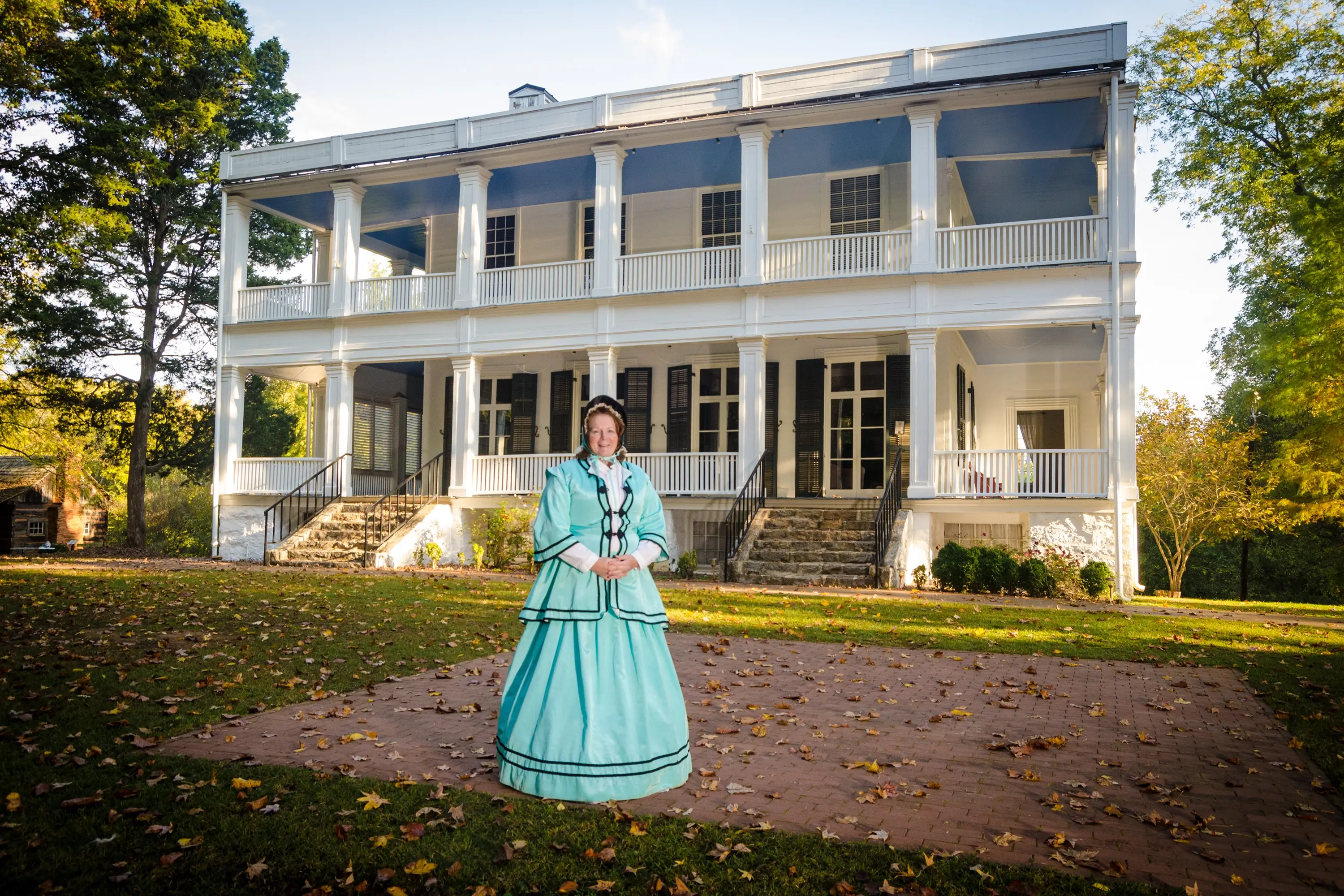 A woman in front of a historic building